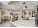 Open concept living room showcasing tile floors, comfortable seating, and natural light at 413 Wine Ct., Conway, SC 29527