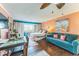 Cozy bedroom area includes a bed, couch, and balcony access with beach-themed decorations and accents at 415 Ocean Creek Dr. # 2330, Myrtle Beach, SC 29572