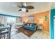 Living room with furniture, open windows, and beach themed decor at 415 Ocean Creek Dr. # 2330, Myrtle Beach, SC 29572