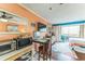 Living room and dining room area with a beach themed decor at 415 Ocean Creek Dr. # 2330, Myrtle Beach, SC 29572