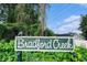 Bradford Creek community sign surrounded by lush greenery and blue skies at 4311 Bradford Circle, Myrtle Beach, SC 29588