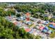 Aerial view of colorful coastal homes in a lush, green community at 4338 Grande Harbour Blvd., Little River, SC 29566