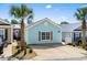 Charming one-story house with light blue siding, well-manicured landscaping, and inviting curb appeal at 4338 Grande Harbour Blvd., Little River, SC 29566