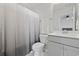 Bathroom featuring a shower with curtain, toilet, neutral walls, and modern vanity with sink at 4410 Honir Dr., Myrtle Beach, SC 29579