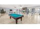 Clubhouse interior featuring a pool table and cozy fireplace, great for social gatherings at 4410 Honir Dr., Myrtle Beach, SC 29579