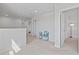Bright hallway with carpeted floors, fresh paint, and lots of natural light at 4410 Honir Dr., Myrtle Beach, SC 29579