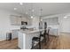Contemporary kitchen design with a granite island, modern appliances, and ample cabinet space for storage at 4410 Honir Dr., Myrtle Beach, SC 29579