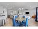 Open-concept living area with wood floors, stainless steel appliances and lots of natural light at 4410 Honir Dr., Myrtle Beach, SC 29579