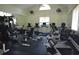 Well-equipped fitness center with a variety of exercise machines and mirrored walls at 444 Dornoch Dr., Pawleys Island, SC 29585