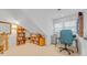 Bright office with a large window, built-in shelving, and ample workspace at 444 Dornoch Dr., Pawleys Island, SC 29585