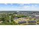 Beautiful aerial view of the community featuring a pool, and surrounded by lush landscaping and waterways at 4506 West Harbor Ct. # U-15, Little River, SC 29566
