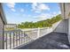 Overlooking lush greenery, this large balcony offers community views and a tranquil outdoor space at 4506 West Harbor Ct. # U-15, Little River, SC 29566