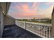 This spacious balcony offers scenic views of the beautifully landscaped community at sunset at 4506 West Harbor Ct. # U-15, Little River, SC 29566