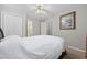 Bright bedroom with a king-size bed, closet space, and easy access to an ensuite bathroom at 4506 West Harbor Ct. # U-15, Little River, SC 29566