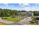 Condo building next to a pool featuring multi-level balconies, well-manicured landscaping, and convenient parking at 4506 West Harbor Ct. # U-15, Little River, SC 29566