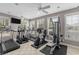 Well-lit exercise room with modern equipment and tile floors at 4506 West Harbor Ct. # U-15, Little River, SC 29566