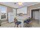 Cozy kitchen with breakfast bar and white appliances at 4506 West Harbor Ct. # U-15, Little River, SC 29566