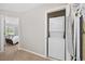 This laundry area features a stacked washer and dryer tucked away in an alcove at 4506 West Harbor Ct. # U-15, Little River, SC 29566