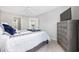 Cozy main bedroom featuring a ceiling fan and easy access to the kitchen and ensuite bathroom at 4506 West Harbor Ct. # U-15, Little River, SC 29566