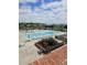 Community pool with many seating options for lounging under the sunny skies at 451 W Palm Dr., Myrtle Beach, SC 29579