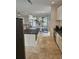 Modern kitchen boasts a large island, stainless steel appliances, and ample counter space at 451 W Palm Dr., Myrtle Beach, SC 29579