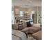 Modern living room with a kitchen island, stainless steel appliances, and stylish decor at 451 W Palm Dr., Myrtle Beach, SC 29579