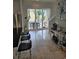 View from kitchen to outdoor living space through large sliding doors at 451 W Palm Dr., Myrtle Beach, SC 29579