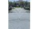 Scenic view of the pond fountain in front of the community clubhouse and pristine landscaping at 451 W Palm Dr., Myrtle Beach, SC 29579