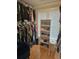 Organized walk-in closet with clothing racks, shelving, and natural light at 451 W Palm Dr., Myrtle Beach, SC 29579