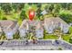 Aerial view of condominium complex near golf course and pond, showing building location at 4705 Wild Iris Dr. # 305, Myrtle Beach, SC 29577