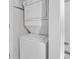 Efficient laundry area features a stacked washer and dryer unit for space-saving convenience at 4705 Wild Iris Dr. # 305, Myrtle Beach, SC 29577