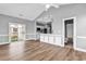 Living room view to kitchen area with breakfast bar and access to bathroom at 4705 Wild Iris Dr. # 305, Myrtle Beach, SC 29577