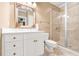 Well-appointed bathroom featuring a white vanity, decorative mirror, and a glass-enclosed shower at 509 Heston Point Dr., Pawleys Island, SC 29585