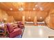 Spacious bedroom with wooden walls, multiple beds, and an inviting and cozy atmosphere at 509 Heston Point Dr., Pawleys Island, SC 29585