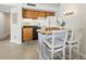 Efficient kitchen with wooden cabinets and adjacent breakfast bar area at 5523 North Ocean Blvd. # 1903, Myrtle Beach, SC 29577
