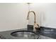 Modern kitchen sink with granite counter and a stylish faucet at 5523 North Ocean Blvd. # 1903, Myrtle Beach, SC 29577