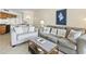 Cozy living room featuring a sofa, loveseat, and nautical-themed decor at 5523 North Ocean Blvd. # 1903, Myrtle Beach, SC 29577