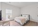 Cozy bedroom features wood-look floors and a bright window with ample light at 5605 Whitebark Dr., Myrtle Beach, SC 29577