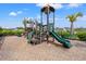 Neighborhood playground featuring slides, stairs, climbing equipment, and mulch ground cover at 5605 Whitebark Dr., Myrtle Beach, SC 29577