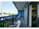 A private balcony with outdoor seating, offering views of the property surroundings at 5905 South Kings Hwy. # 116B, Myrtle Beach, SC 29575