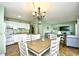 Cozy dining area open to the kitchen and living room, creating a connected and comfortable space for Gathering and guests at 5905 South Kings Hwy. # 116B, Myrtle Beach, SC 29575