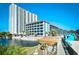 Complex with waterfront views, a bridge, and easy access to outdoor amenities at 5905 South Kings Hwy. # 116B, Myrtle Beach, SC 29575
