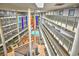Spacious indoor pool and atrium with colorful banners in a multi-story building at 5905 South Kings Hwy. # 116B, Myrtle Beach, SC 29575