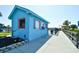A charming blue outdoor shop with pink trim near a bridge at 5905 South Kings Hwy. # 116B, Myrtle Beach, SC 29575