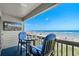 Relax on the balcony with a stunning view of the ocean and enjoy the outdoor TV and comfortable seating at 6000 N Ocean Blvd. # 119, North Myrtle Beach, SC 29582