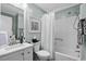 Neat bathroom featuring a shower and tub combo, as well as a modern vanity and sink at 6000 N Ocean Blvd. # 119, North Myrtle Beach, SC 29582