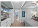 Charming bedroom with a flatscreen TV, closet space, and easy access to a calming balcony at 6000 N Ocean Blvd. # 119, North Myrtle Beach, SC 29582