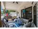 Cozy porch with a table and chairs, a perfect spot for enjoying the outdoors at 6001-5742 S Kings Hwy., Myrtle Beach, SC 29575
