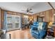 Bright living room with hardwood floors and French doors leading to outdoor space at 6001-5742 S Kings Hwy., Myrtle Beach, SC 29575