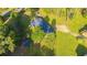 Overhead shot of a single-story home with a metal roof and ample lawn space at 64 Highway 521, Andrews, SC 29510